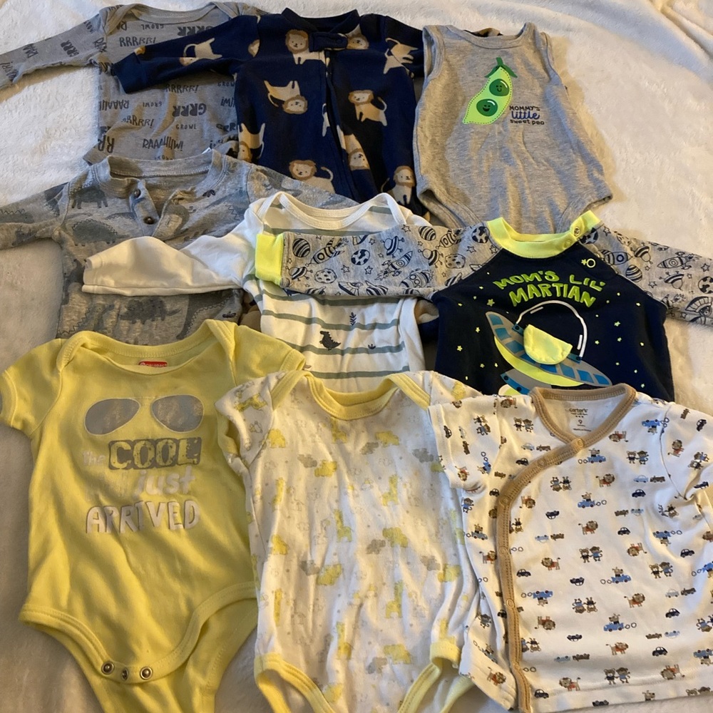 Bundle of baby boy clothes. 3 different sizes